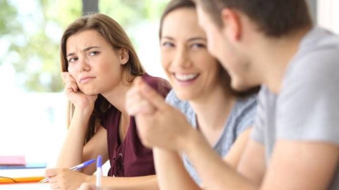 Should a female friend hang out with a guy who has a girlfriend if she gets jealous?