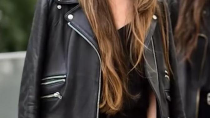 Which girl has better style? All black, or black and white?