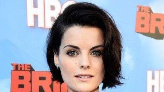 Guys, (pics attached) is this haircut too short for a girl? Is it still feminine and attractive?