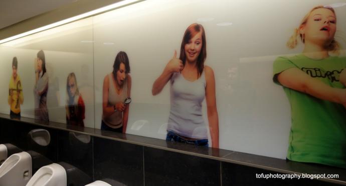 What is your opinion on those women pictures above urinals in mens restrooms?