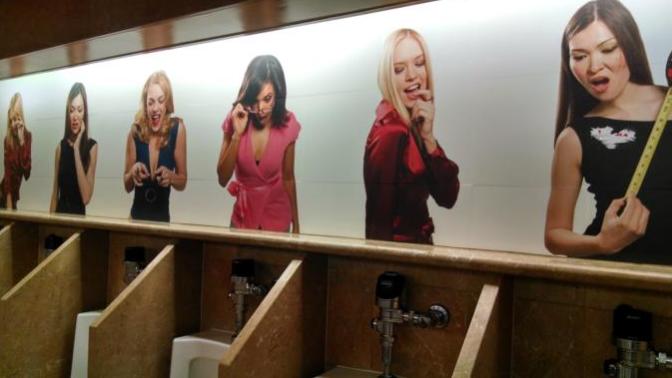 What is your opinion on those women pictures above urinals in men's restrooms?