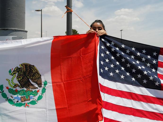Can someone explain to me why a lot Hispanic Americans fly Mexico flags with USA ones? What are your thoughts on it?