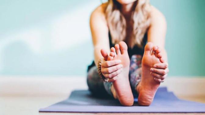 Should yoga be practiced socks-less? Is it disrespectful to wear socks?