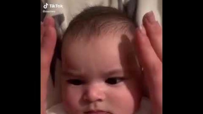 Is this behavior of squishing a baby's face found in most people?