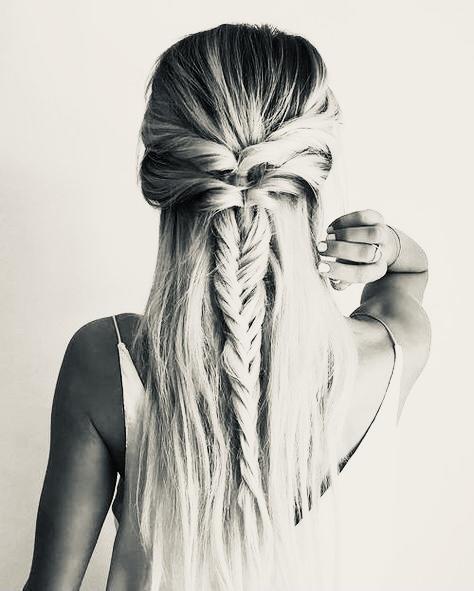 What hair style is best for an 8 hour travel 🧳 (wearing winter coat with large good) ?