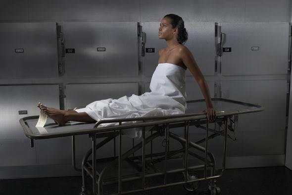 You wake up from dead, in front of you is a terrified morgue worker. What do you do/say?
