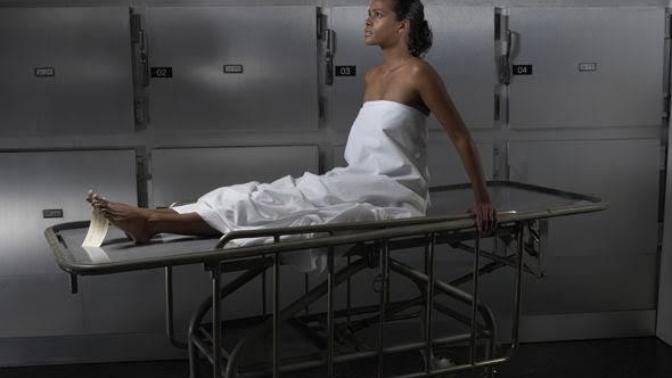 You wake up from dead, in front of you is a terrified morgue worker. What do you do/say?