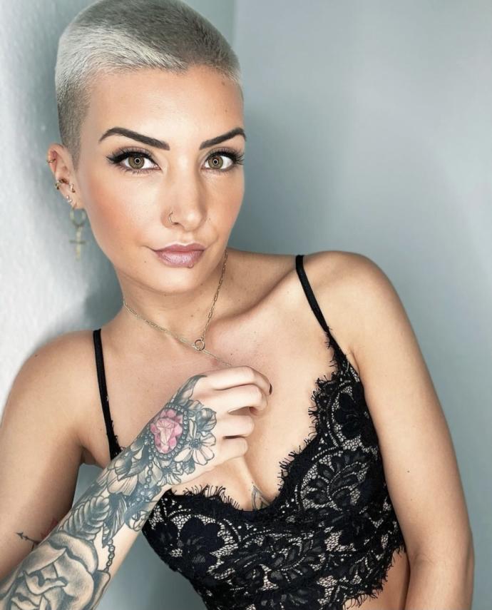 I want to cut my hair short. What looks better, a pixie cut or a buzzcut?