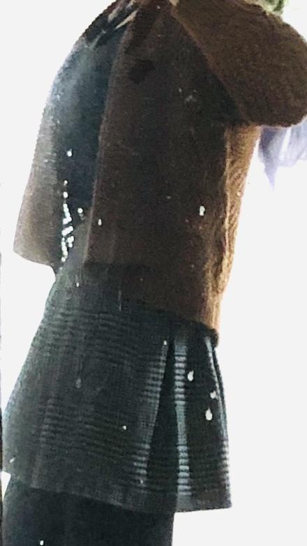Hard to pick up color but from what you can see (burnt brown cardigan with plaid black / grey skirt black tights) clash badly or ok?