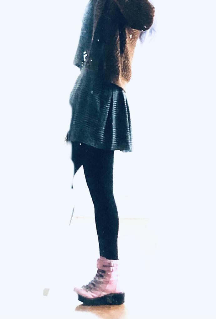 Hard to pick up color but from what you can see (burnt brown cardigan with plaid black / grey skirt black tights) clash badly or ok?
