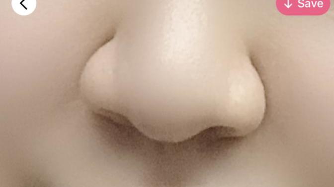 Which do you prefer the slightly edited nose or the edited 3 x smaller nose?