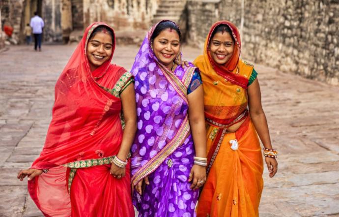 Why do Indian woman wear traditional clothing but other Asians dont?