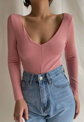 Which color of this top would look better with white hair?