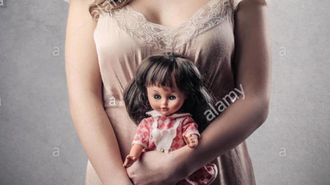 Would you date a woman who still had dolls?