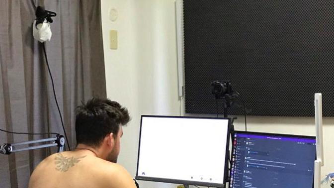 Can you guess the tattoo on his back? what picture is it?
