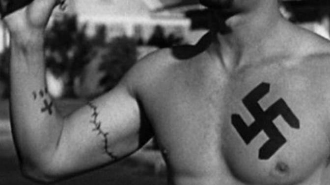 Iam not racist no way dont like swastika tattoo?