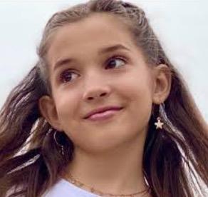 Guys, a girl with black hair, white skin and big black eyes or is this girl?
