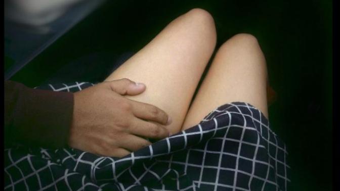 He grabs my thigh near his friends. what that means?