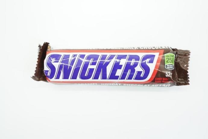 Is it rude to tell a woman whos on her period to eat a snickers?