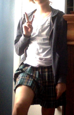 Cousin 2, plaid skirt, above the knees