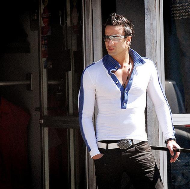 man with tight shirt
