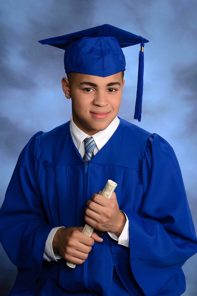 My girlfriend holds on to her male besties grad photo. Is it normal for me to feel uncomfortable?