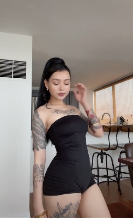 Guys, would you still date her regardless of the tattoos?