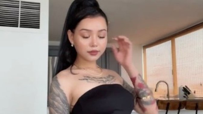 Guys, would you still date her regardless of the tattoos?