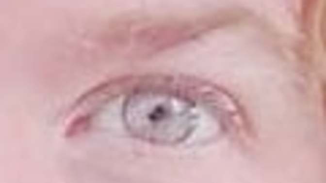 What color eyes & hair would you say this person has?