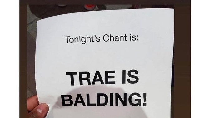 Knicks fans make fun of Trae Young’s head balding at 22 years old. Passes papers around telling other fans what to say. Ok or not ok?