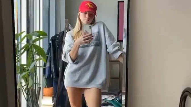 Which do you think, is she bottomless or just wearing really short shorts?
