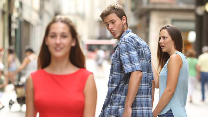 Which girl do you think is hotter in the distracted boyfriend meme?