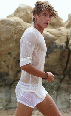 Why do some women find men with a lot of masculine features unattractive but men find pretty much every women who looks feminine attractive?