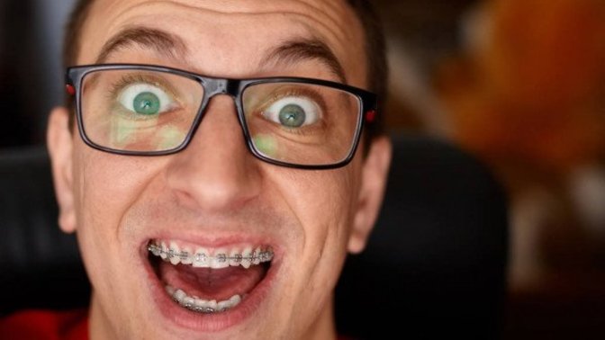 Girls, Do braces make a guy unattractive? Would you date a guy with braces?