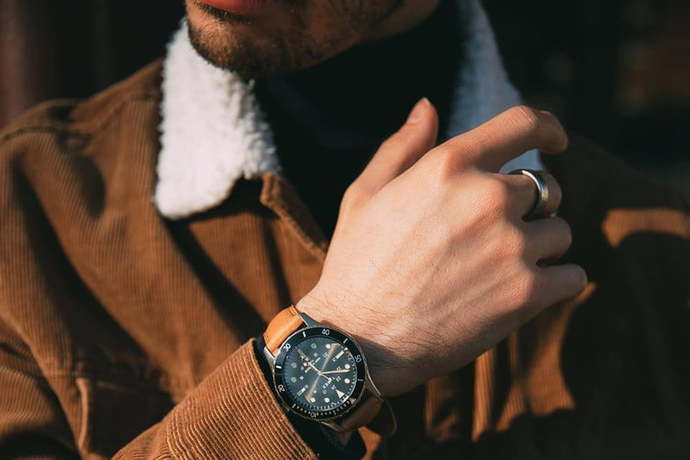 Whats the more attractive accessory to put on guys wrists?
