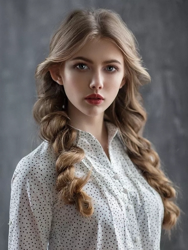 Guys, what does she look like? Do you think she is attractive?