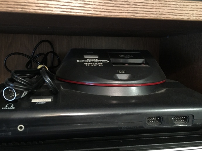 Model 1 genesis with the power base converter that makes it backwards compatible with Sega master system games