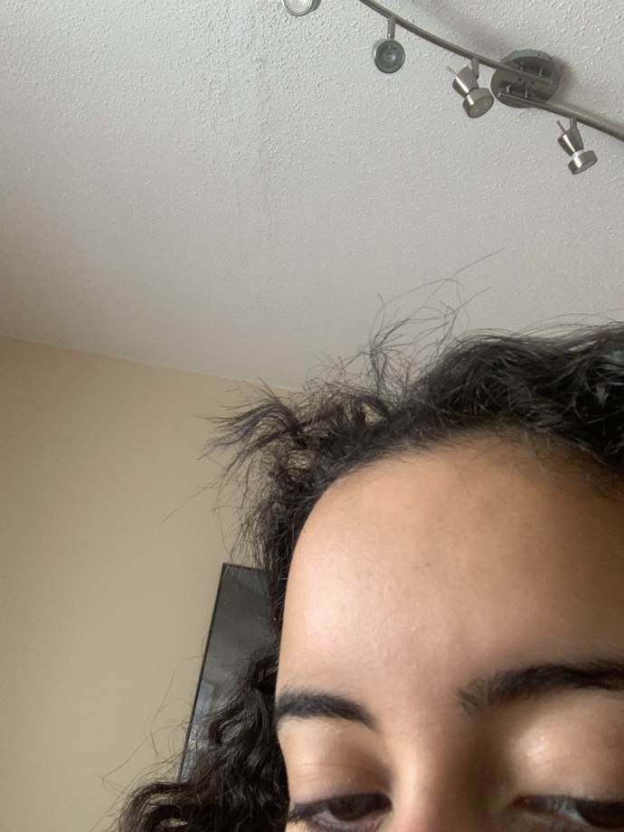 What to do when you have hair that sticks out like this what could I do to stop my hair from doing this should I cut it off?