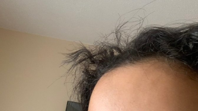 What to do when you have hair that sticks out like this what could I do to stop my hair from doing this should I cut it off?