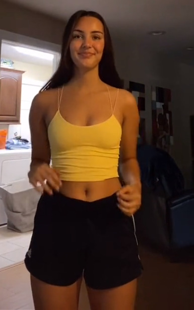 Thats me in the outfit. Im 19 if you must know. Im trying my hardest to smile, dont judge, lol.