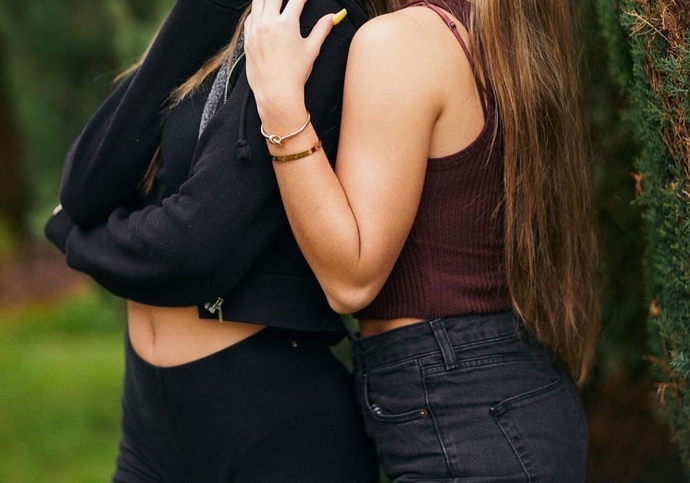 My girlfriend took this photo with her friend. Is she bisexual?