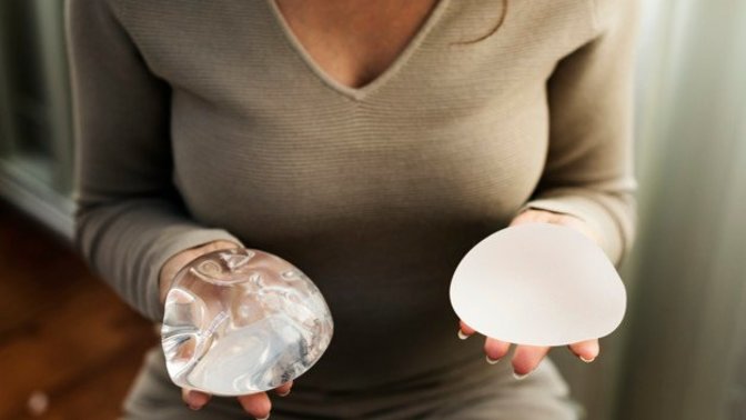 Girls would you feel offended if your man said he would pay for your boob job?