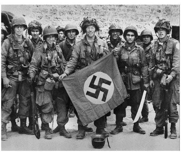 If you saw a photo of someone holding a Nazi flag, would you assume that they are a racist?