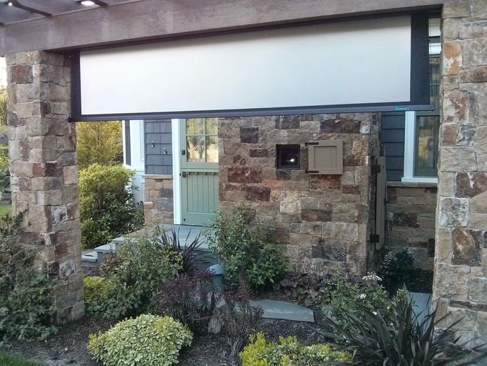 Outdoor projector system with 5.1 rock speakers.