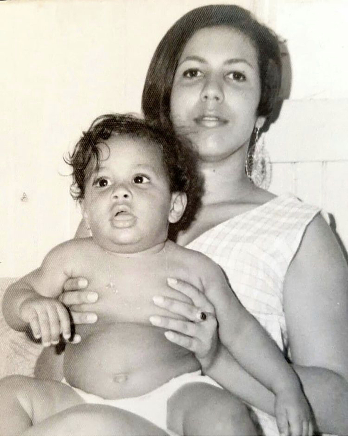 Do I look like any of my parents or family members I feel like I look adopted lol?