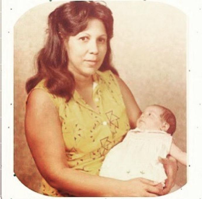 Do I look like any of my parents or family members I feel like I look adopted lol?