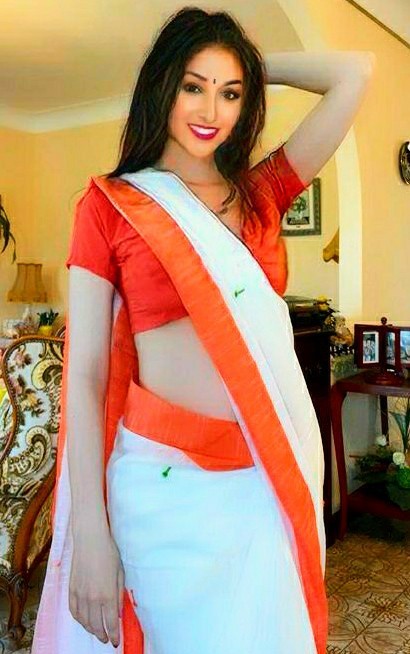 Do I look sexier in saree ! ? If so more sexier in either 1 st one or 2 nd?