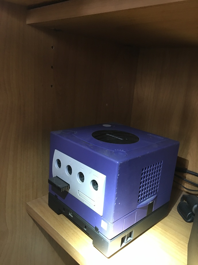 My gamecube with a gameboy player attachment underneath it (plays gba gbs and original gameboy games)