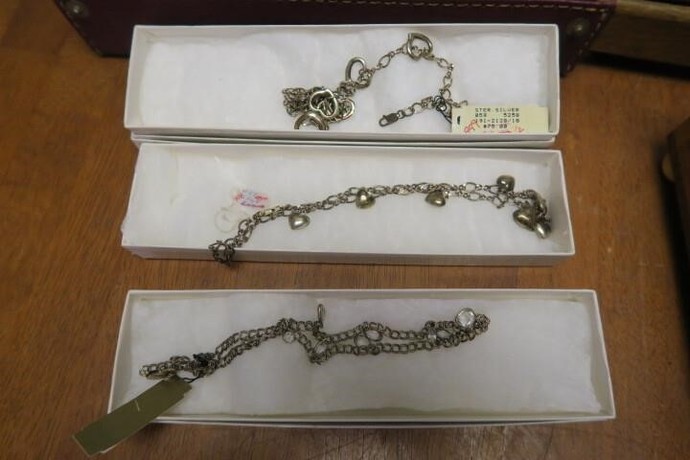 How about these auction items , which will have the most gold and silver?