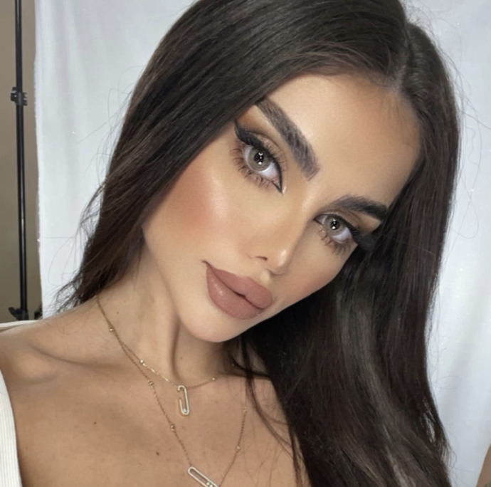 DOES SHE LOOK LIKE A HIGH FASHION MODEL?